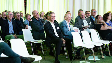 Aanwezigen in de zaal.